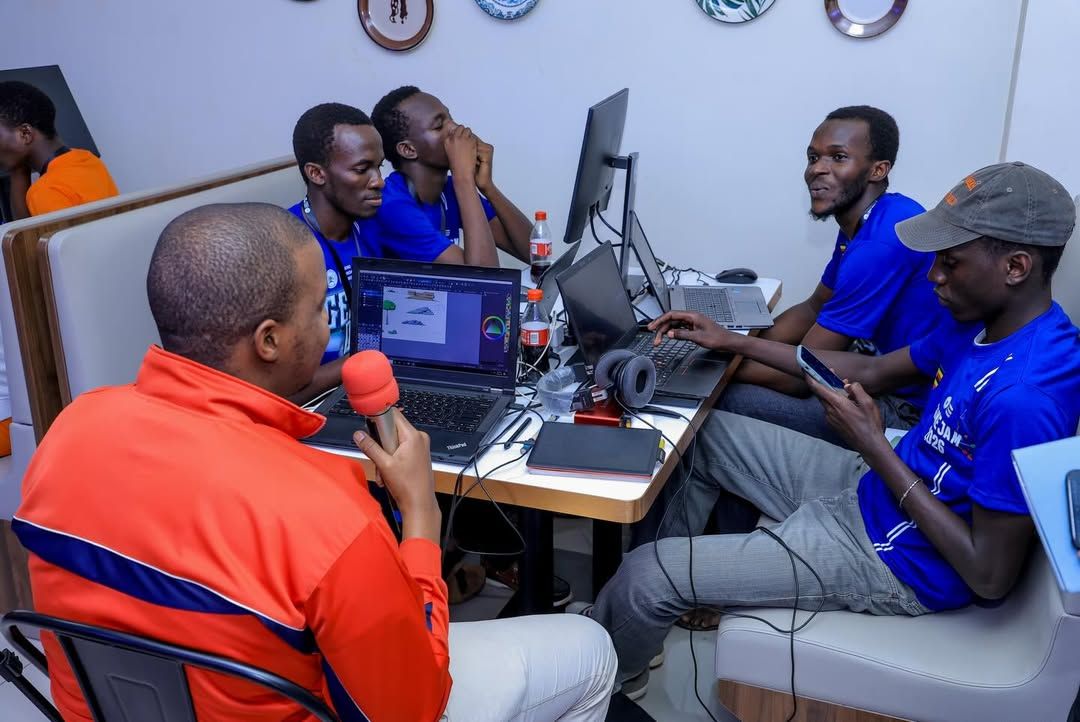Two Game Jam 2026 participants laughing during the event